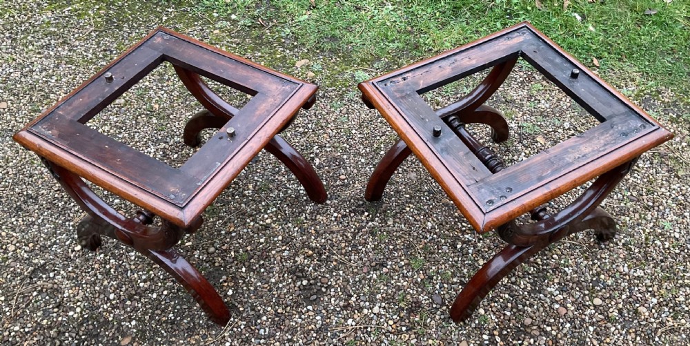A pair of William IV mahogany x-frame stools with neutral light beige upholstered padded tops and turned central stretchers. View VIII