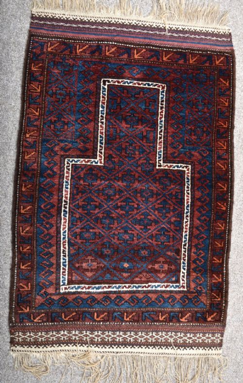 an antique afghan baluch prayer rug - CATEGORY: ANTIQUE RUGS - DATED 1910