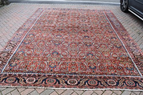 an antique persian heriz carpet 385x314cm - CATEGORY: ANTIQUE RUGS - DATED 1900