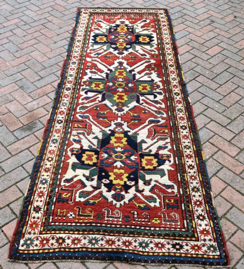 AN ANTIQUE CHELEBERED EAGLE KAZAK LONG RUG 285X102CM - ADDITIONAL PHOTO 2