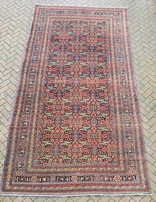 an antique north west persian roomsize carpet 410x213cm - CATEGORY: ANTIQUE RUGS - DATED 1850
