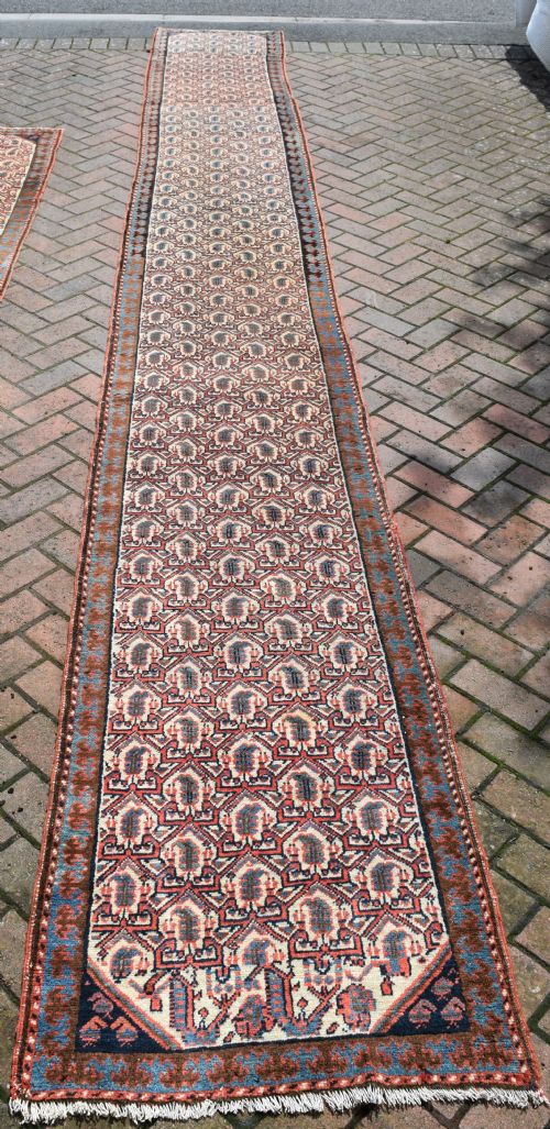 A PAIR OF VERY LONG NARROW ANTIQUE RUNNERS - ADDITIONAL PHOTO 1