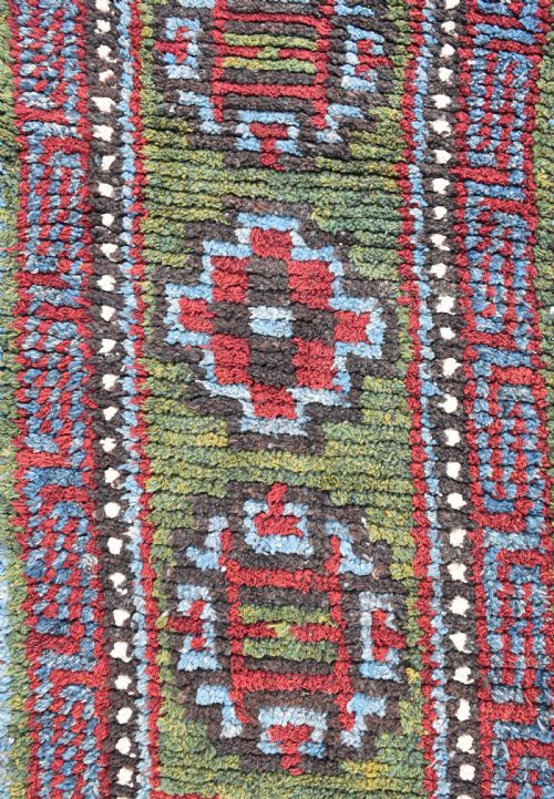 A RARE GREEN GROUND TIBETAN MONASTIC SEATING MAT FROM THE WANGDEN VALLEY TIBET - ADDITIONAL PHOTO 1