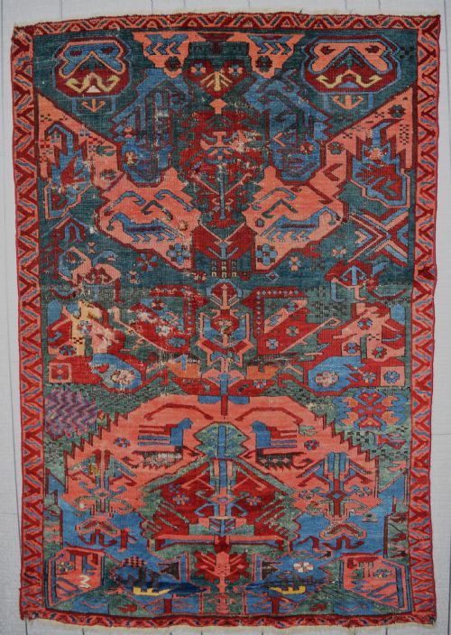 a rare cacuasian seychor dragon rug on green ground 153x103 cm - CATEGORY: ANTIQUE RUGS - DATED 1880