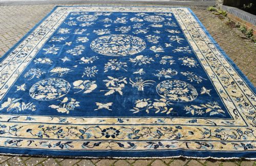 A GOOD ANTIQUE PEKING ROOMSIZE CARPET 449X349 CM