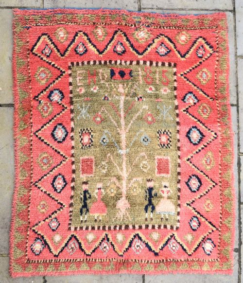AN EARLY FINNISH RYA WEDDING RUG DATED 1815
