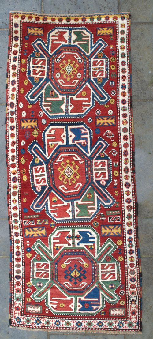 a good antique kazak rug 251x98cm - CATEGORY: ANTIQUE RUGS - DATED 1880