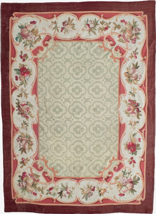 AN ANTIQUE AUBUSSON CARPET 329X232CM