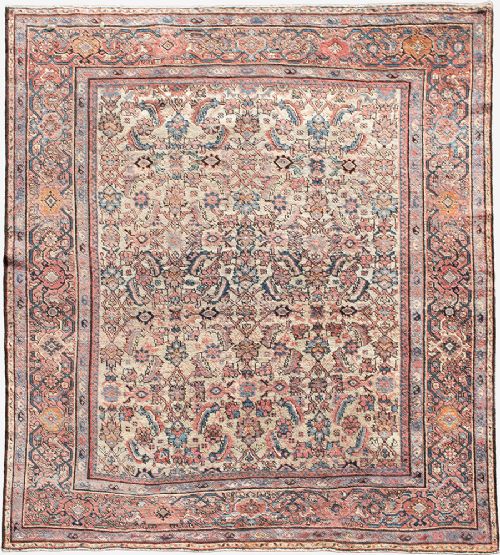 An antique Persian Ferahan wool carpet featuring a dense floral pattern on a cream field surrounded by a terracotta multi-banded border. View II