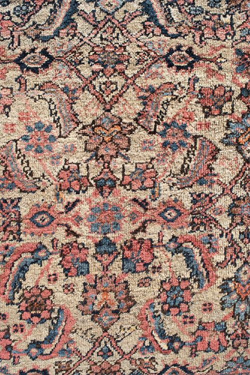 An antique Persian Ferahan wool carpet featuring a dense floral pattern on a cream field surrounded by a terracotta multi-banded border. View VI