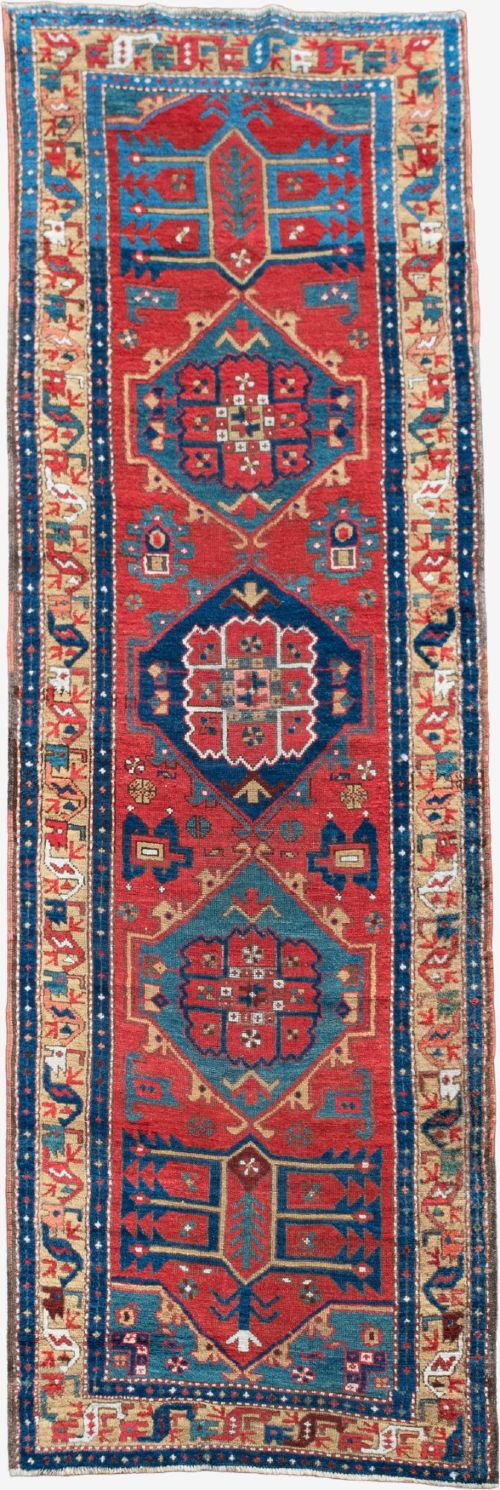 An Antique Heriz Runner 330x105cm