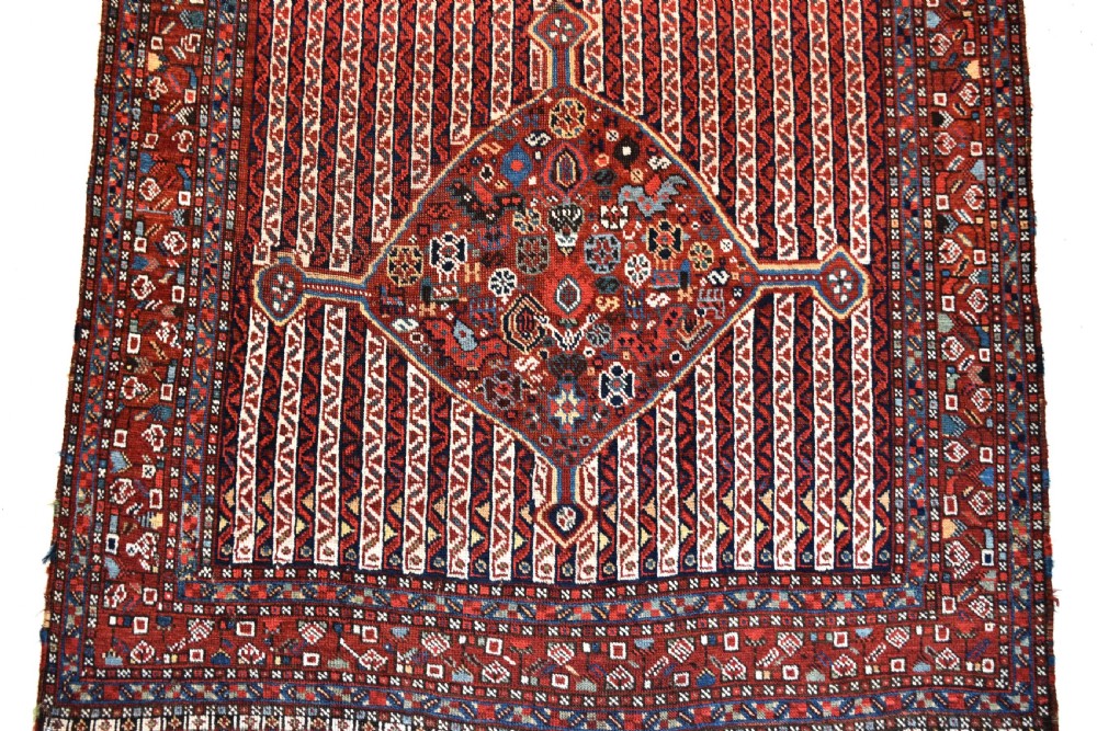 An antique South West Persian Khamseh tribal rug View II