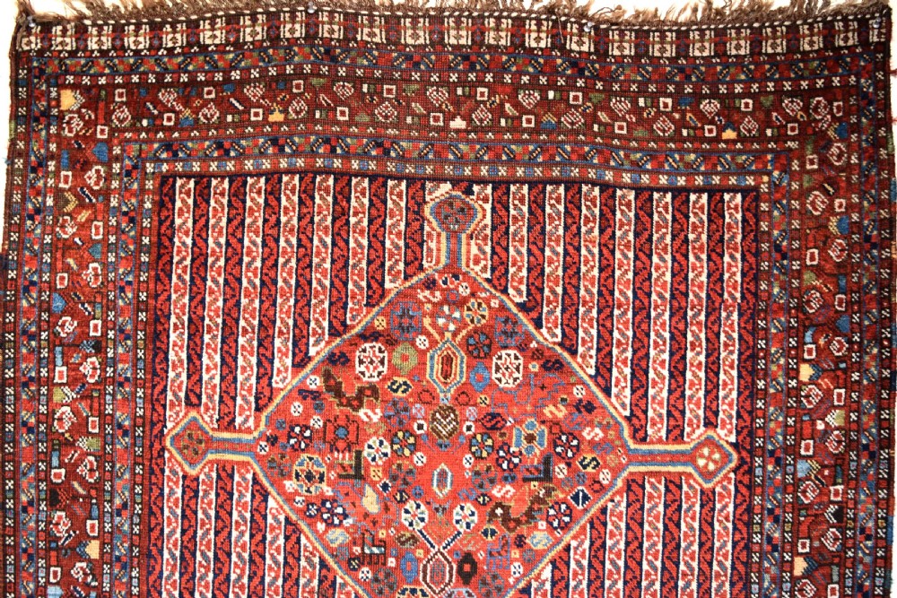 An antique South West Persian Khamseh tribal rug View IV