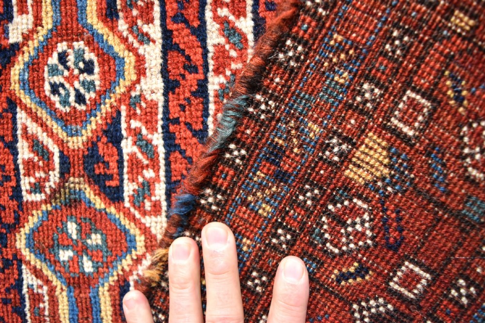 An antique South West Persian Khamseh tribal rug View V