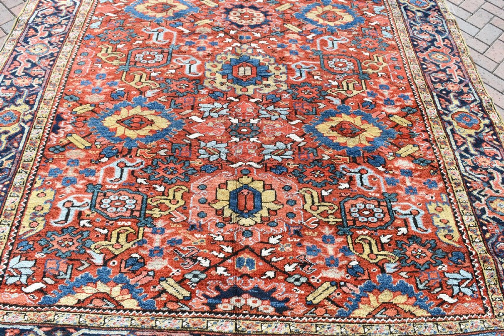 Antique Persian Heriz carpet with all over design