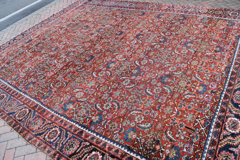An antique Persian Heriz carpet 385x314cm View II