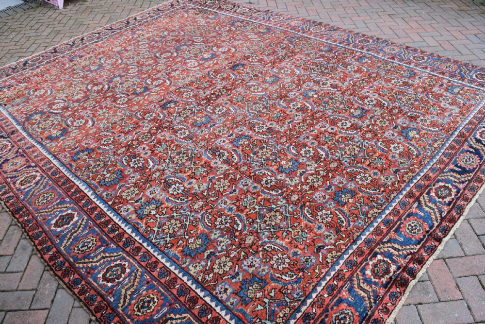 An antique Persian Heriz carpet 385x314cm View IV