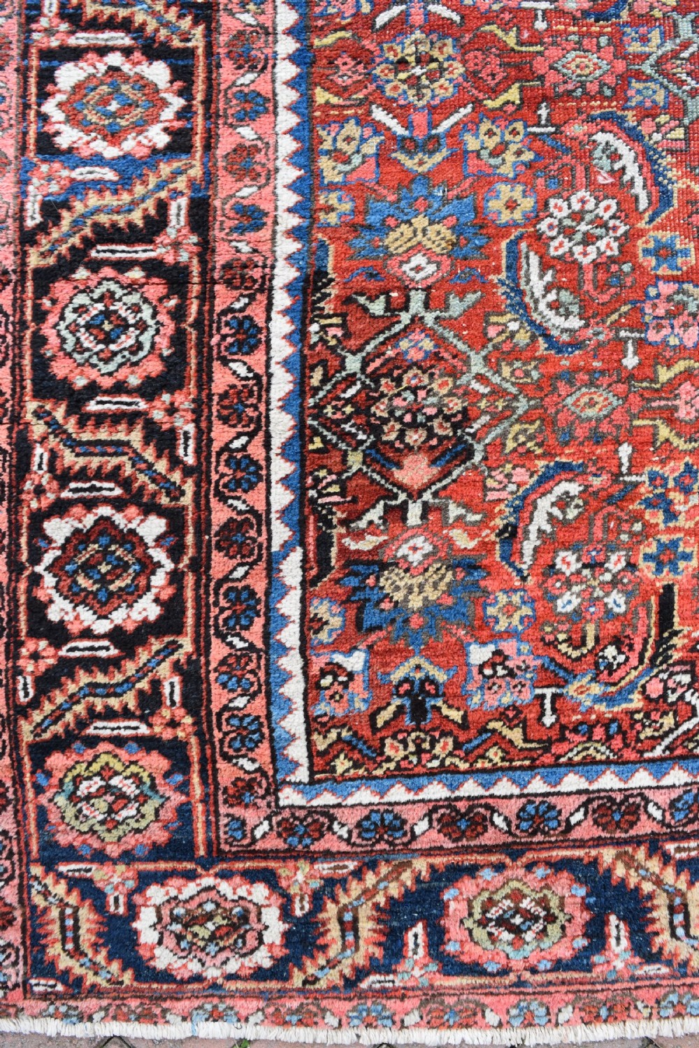 An antique Persian Heriz carpet 385x314cm View V