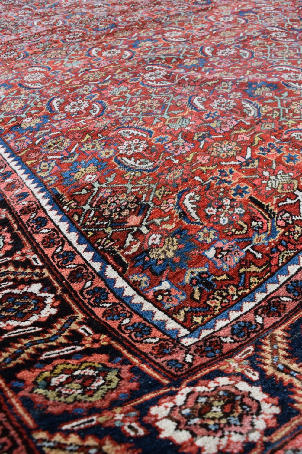 An antique Persian Heriz carpet 385x314cm View VI