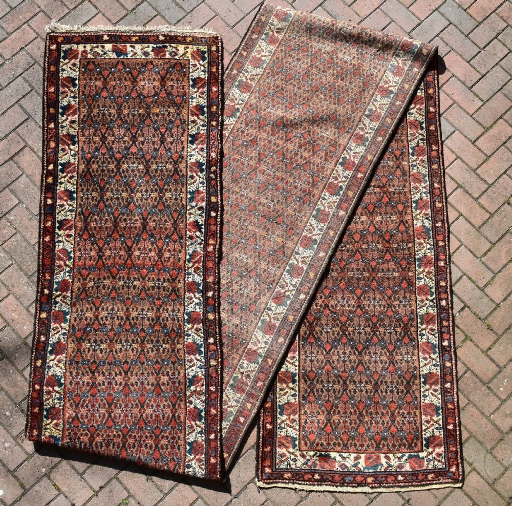 A very long and narrow antique Persian Hamadan runner 641x85cm