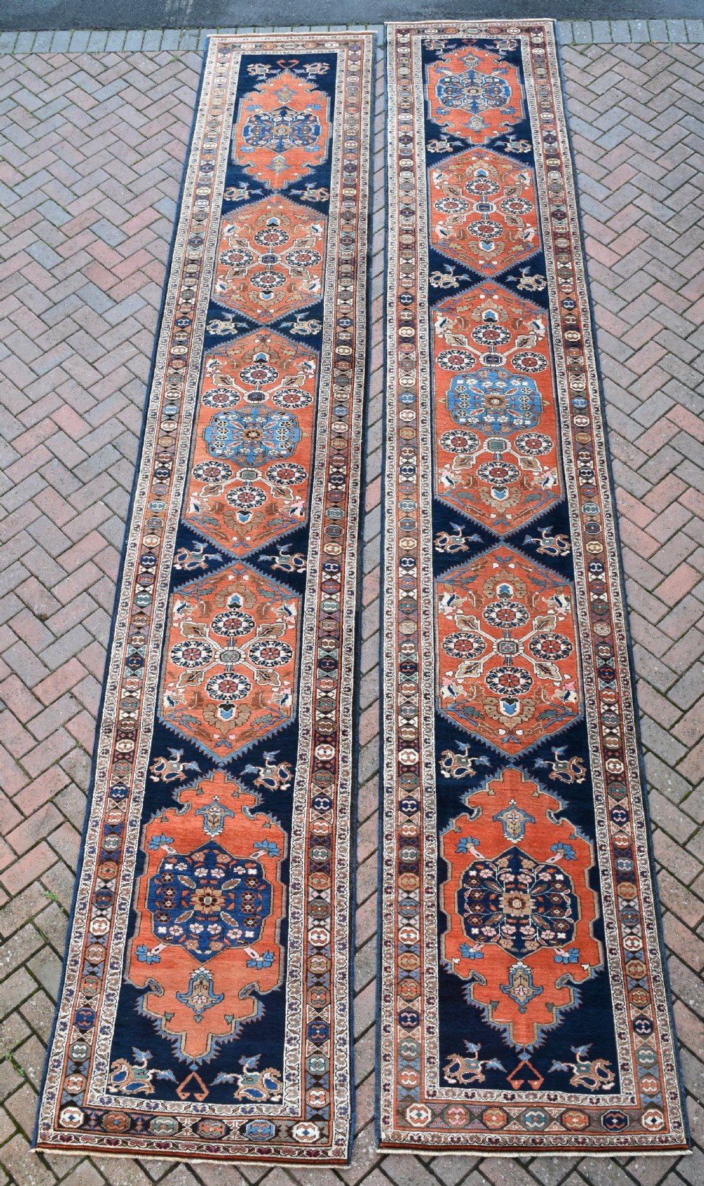 Pair of very long antique Heriz runners