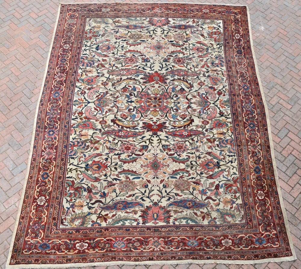 Fine antique Mahal room size carpet on ivory ground.440x324cm View V