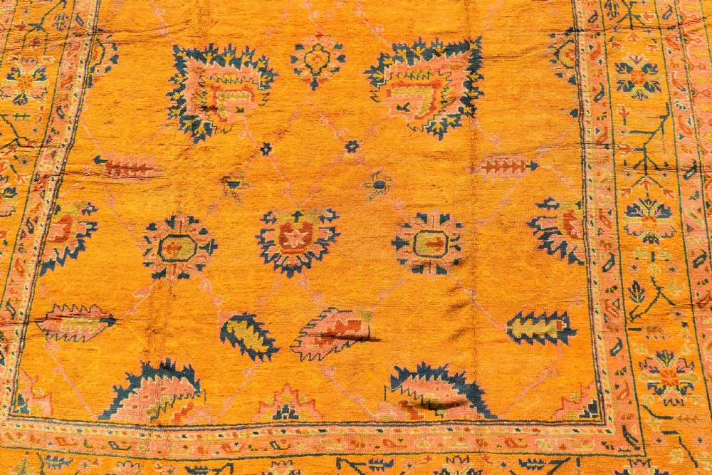 A very large antique Ushak carpet 505x394cm View V