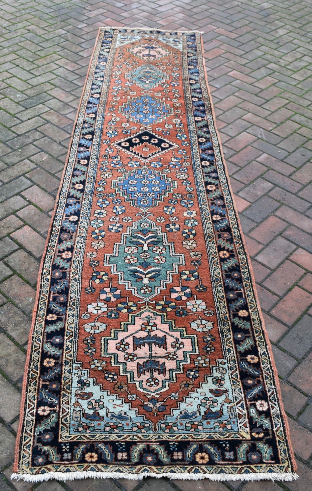 A good antique Heriz narrow runner 322x81cm View VI