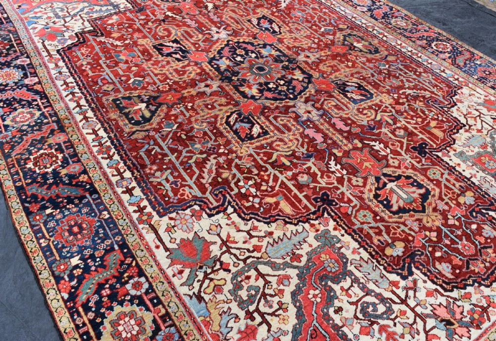 An unusual antique roomsize Heriz carpet  410x293cm View V