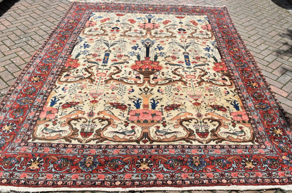 Fine and unusual antique Qum carpet 330x238cm