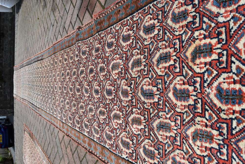 A pair of very long narrow antique runners View VII