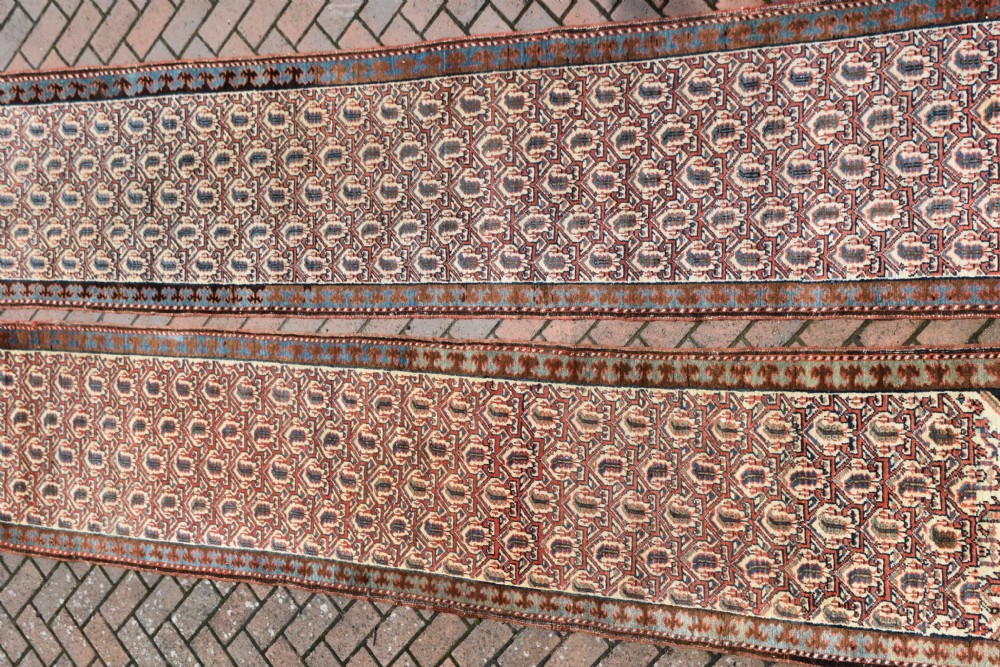 A pair of very long narrow antique runners View VIII
