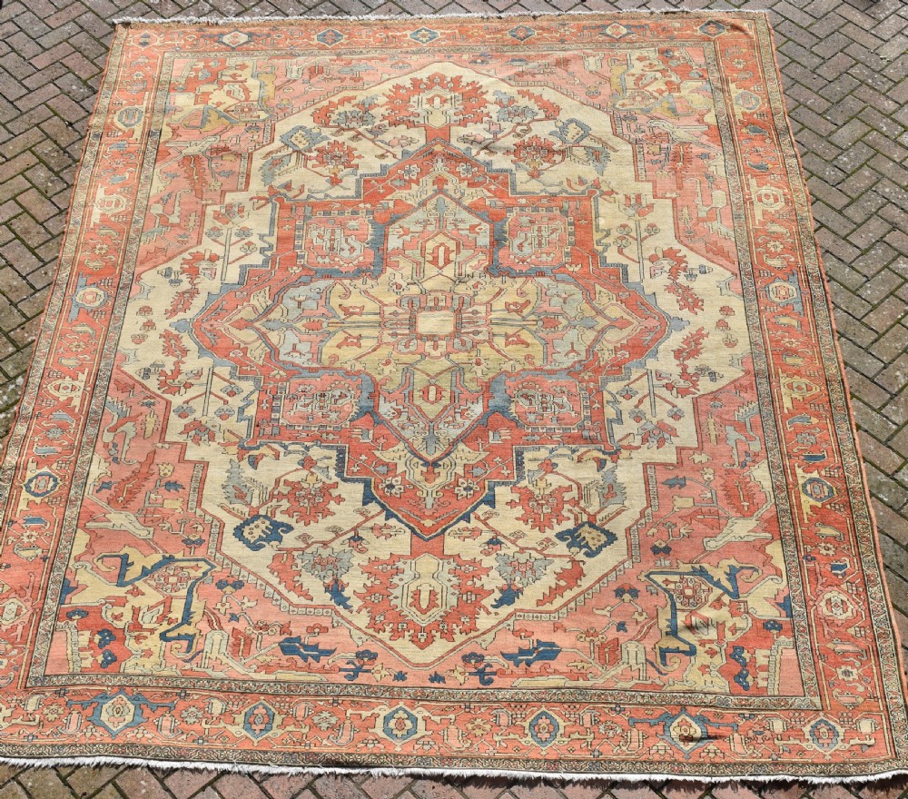 An exceptional antique Serapi carpet 345x290cm