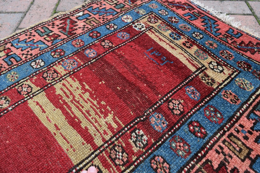 An antique North West Persian narrow runner 237x79cm View III