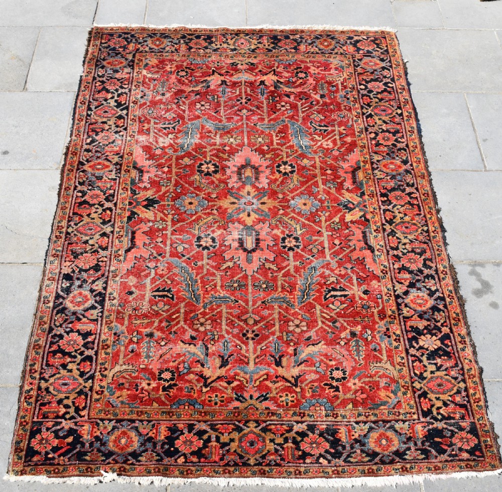 An antique Small roomsize Heriz carpet with allover design 283x184cm