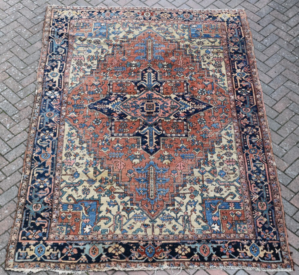 An antique small room size Heriz Carpet 283x203cm