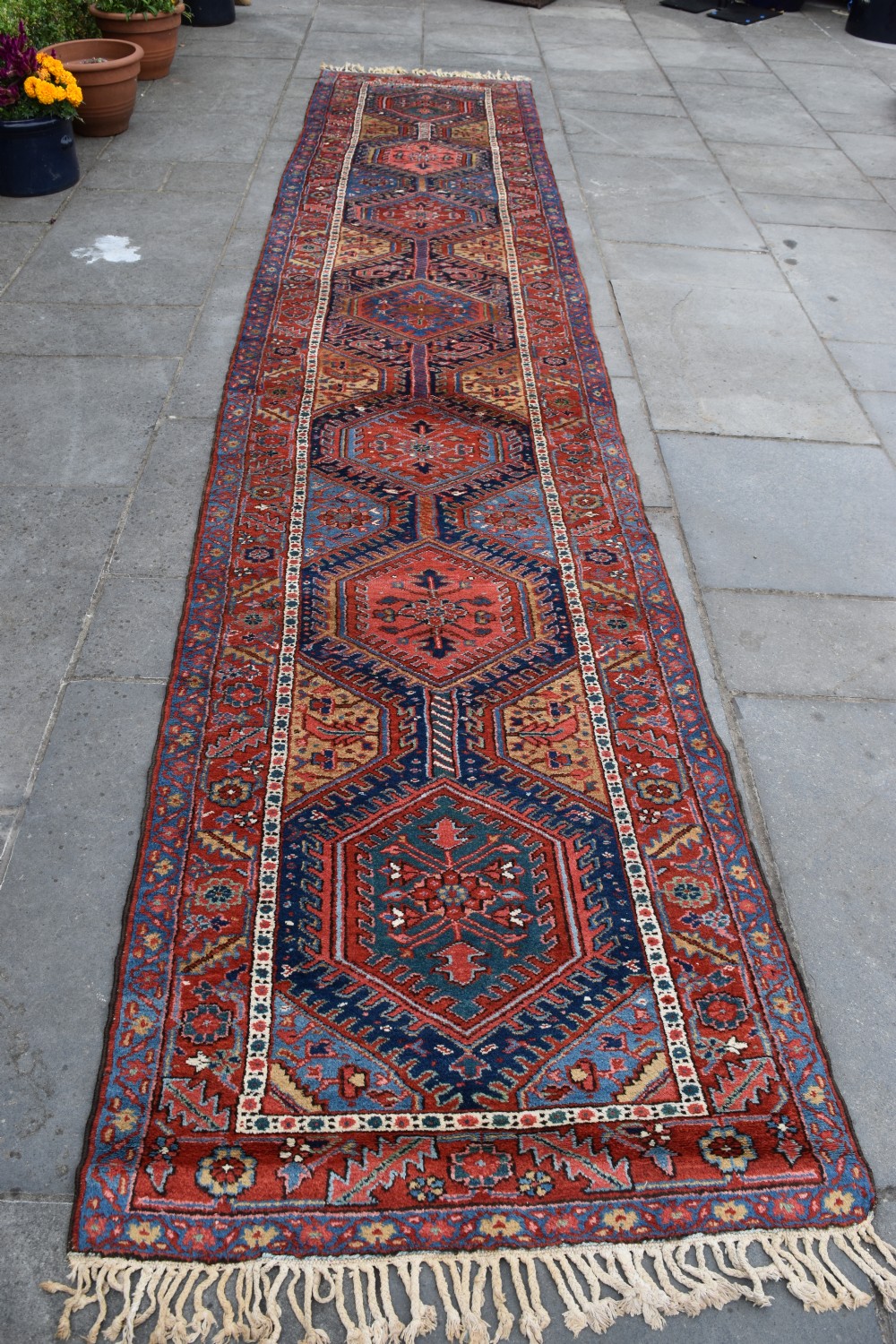 A large antique Heriz runner 530x105cm