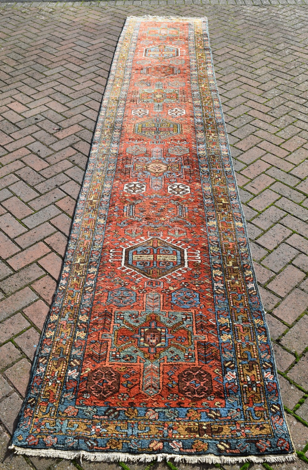 A good antique Heriz narrow runner 434x84 cm