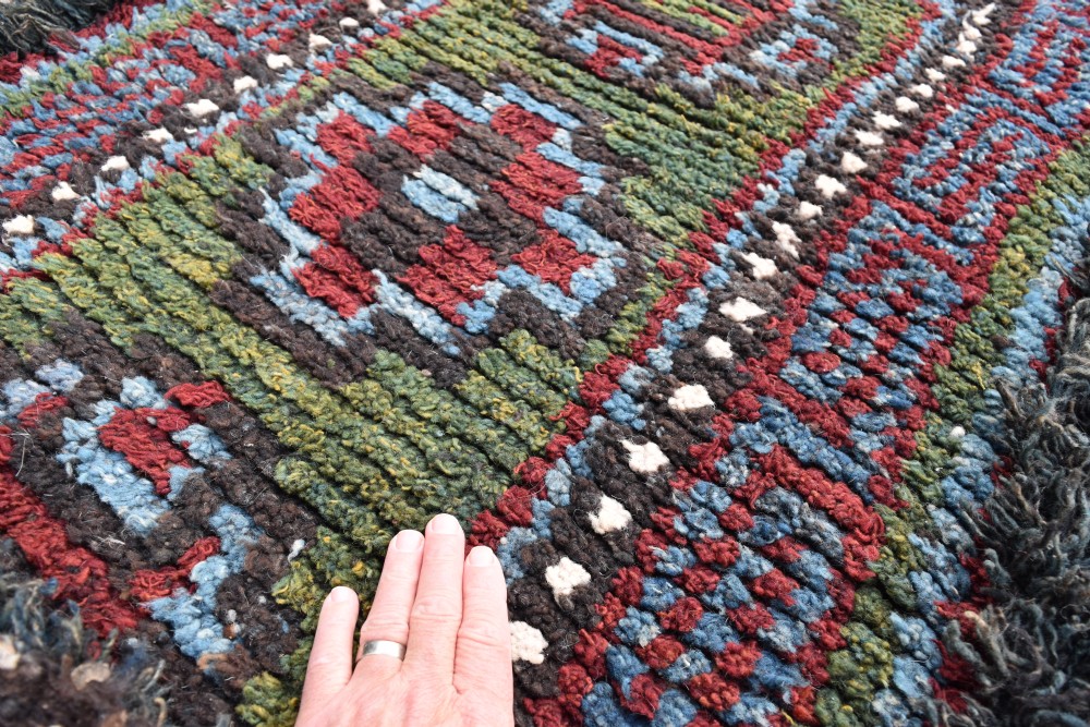 A rare green ground Tibetan monastic seating mat from the Wangden valley, Tibet View V