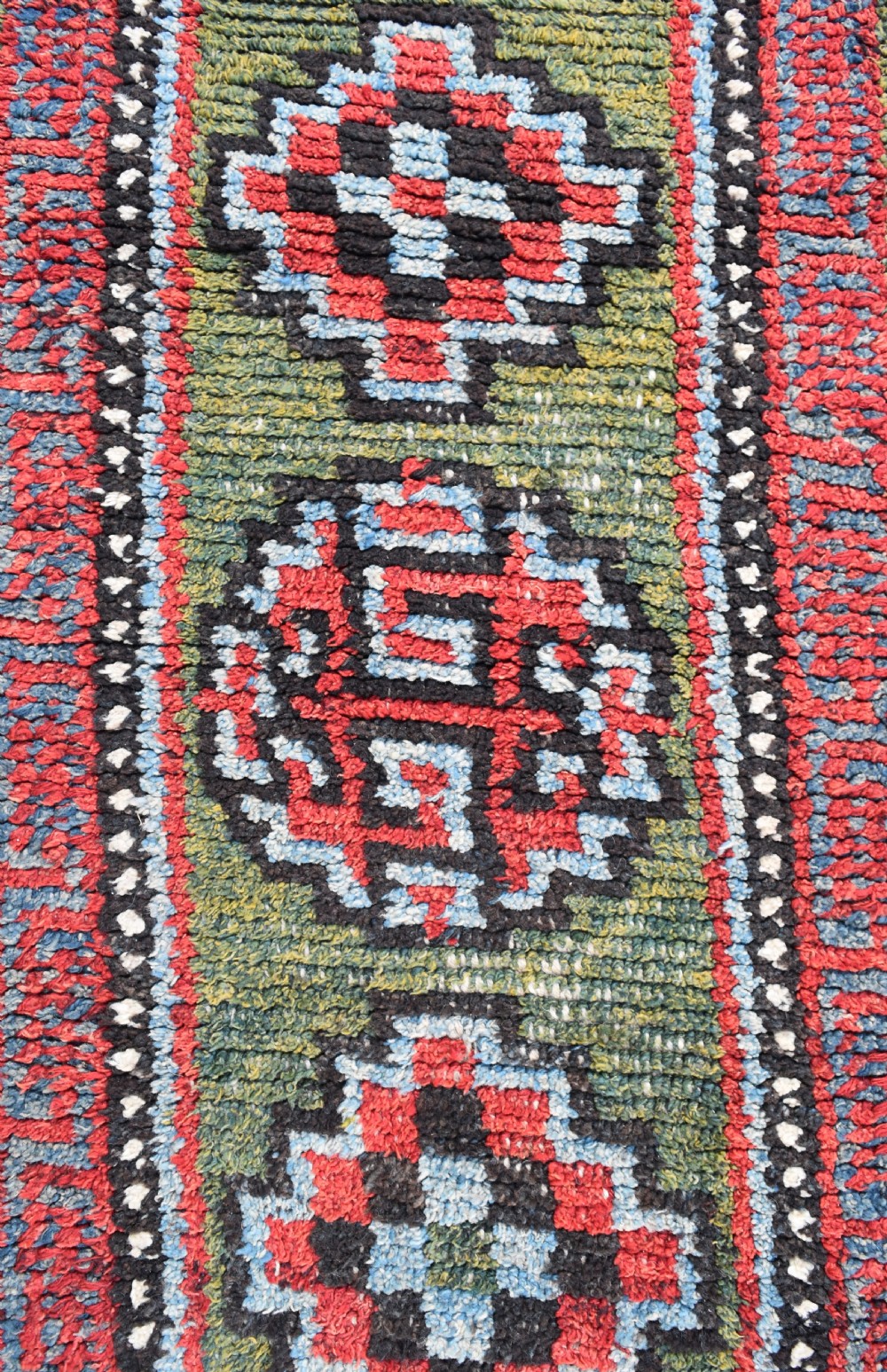 A rare green ground monastic seating mat from the Wangden valley, Tibet. View II