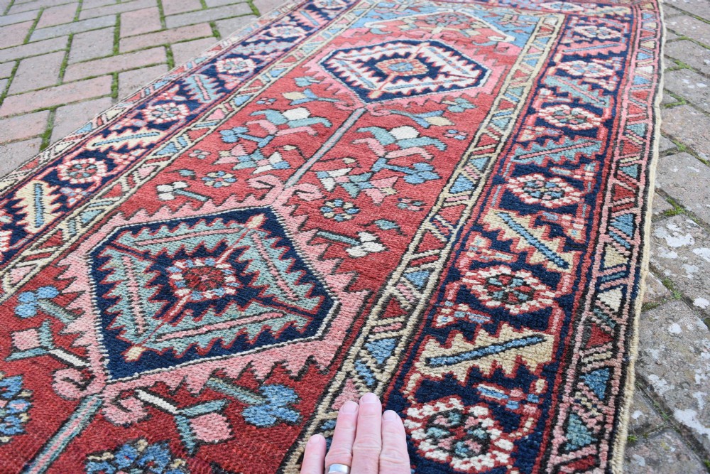 An antique narrow Heriz runner 354x78cm View IV