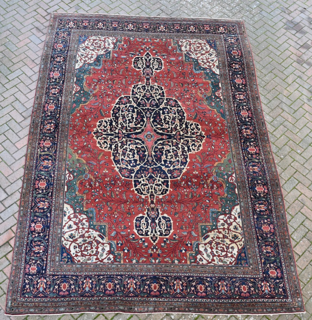 An exceptional antique Ferahan carpet 399x264cm
