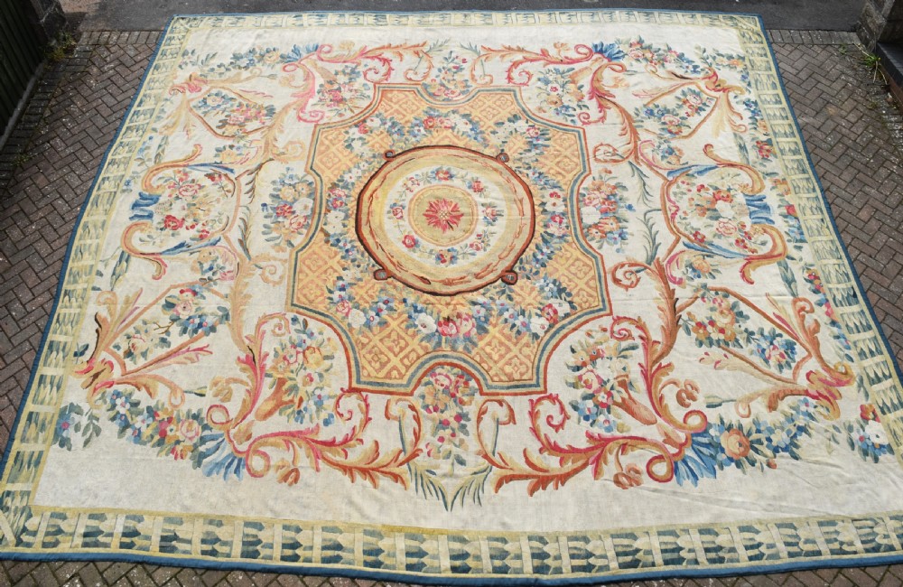 A late 18th century Aubusson  carpet of massive proportions 590x500cm