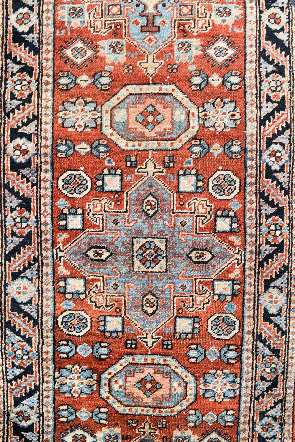 An antique Heriz runner of long narrow proportions 530x80 cm View II