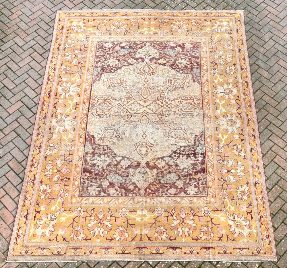 An antique Feseneh country house carpet 343x253cm