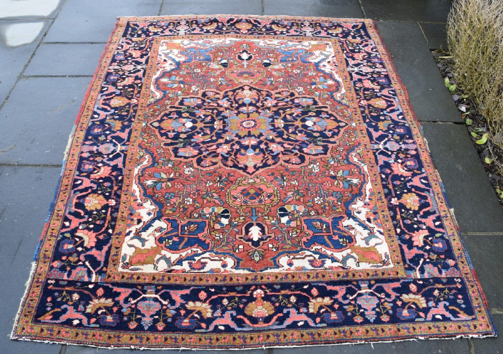 An antique Heriz rug 199x152cm View II