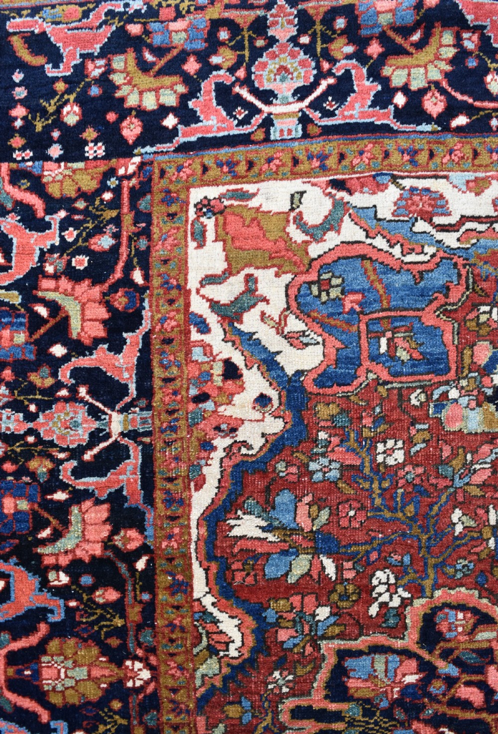 An antique Heriz rug 199x152cm View III