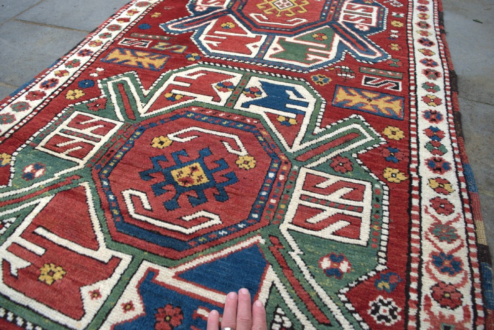 A good antique Kazak rug 251x98cm View III
