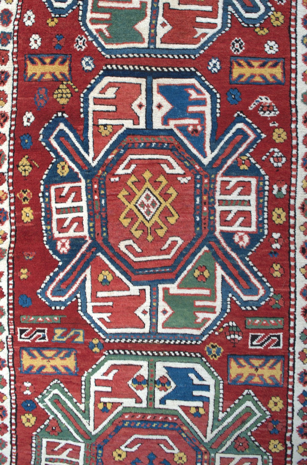 A good antique Kazak rug 251x98cm View V