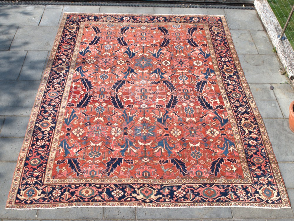 Antique Heriz carpet 335x273 cm